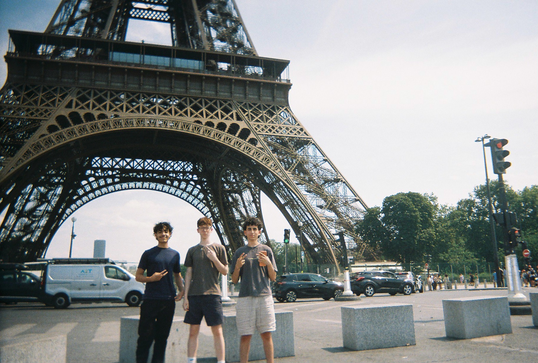 Three friends in front of the Eiffel Tower